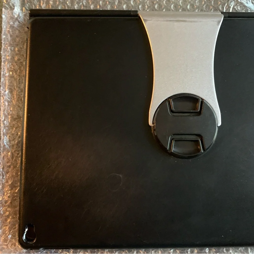FUC ProCase keyboard case for iPad Pro 12.9”. Black and silver. Charging cord.